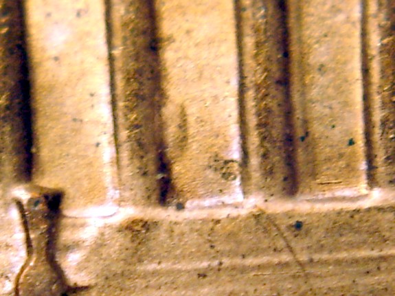1986-Lincoln-Memorial-Cent--What-Is-The-Extra-Metal-Inside-Column-#4?